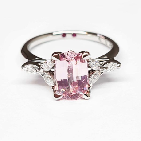Emerald cut pink sapphire platinum engagement ring