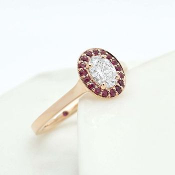 Oval diamond ruby halo rose gold engagement ring