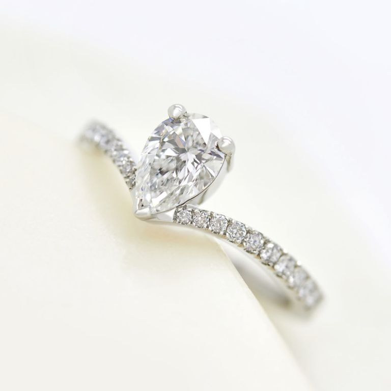 Pear diamond platinum engagement ring pave