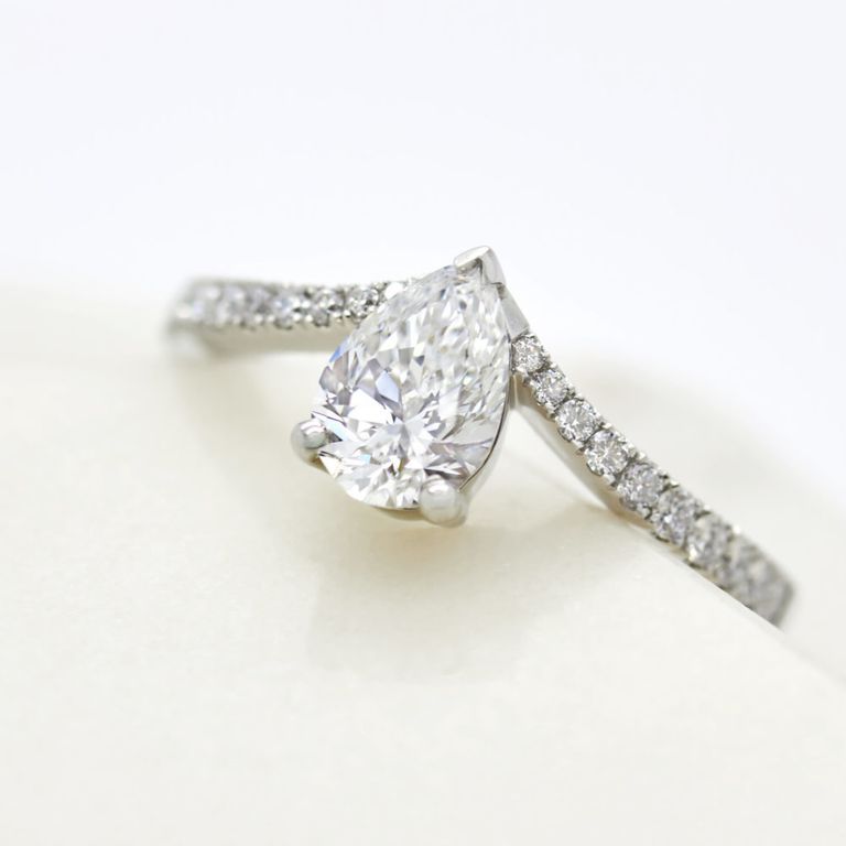 Pear diamond platinum engagement ring pave