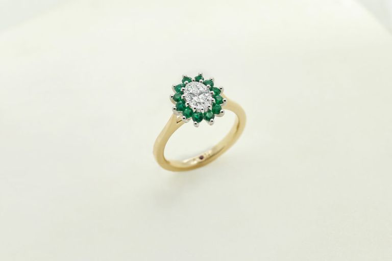 Yellow gold oval diamond emerald pave engagement ring