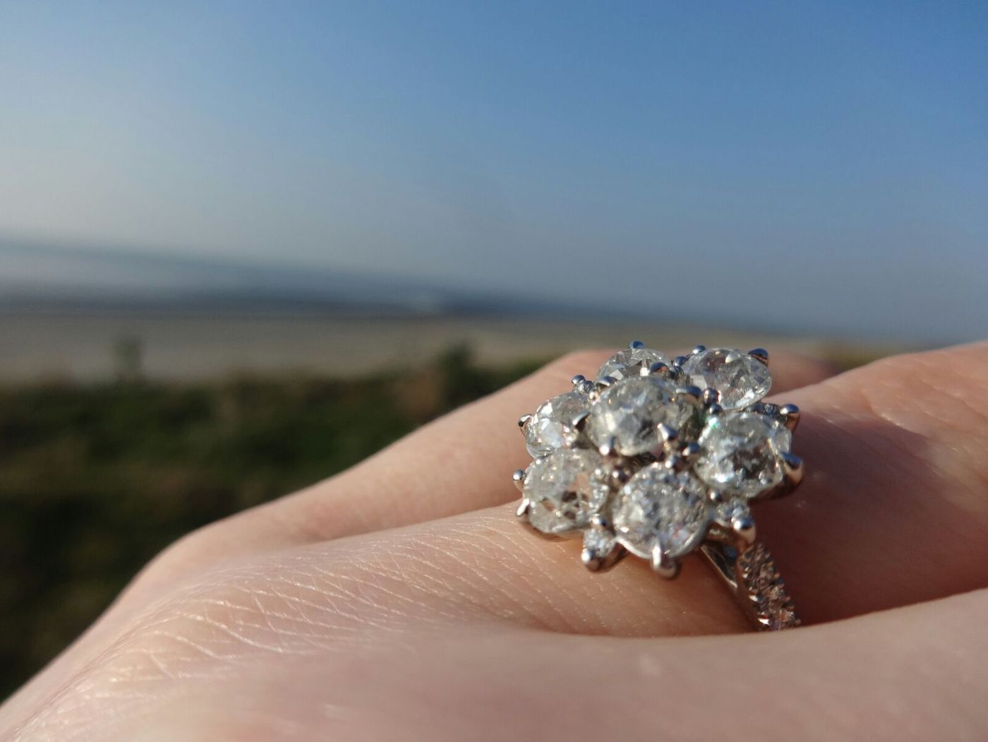 Old european diamond cluster engagement ring