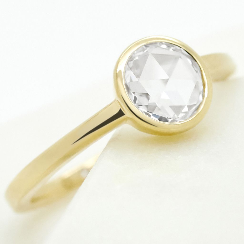 Rose cut diamond bezel set yellow gold engagement ring
