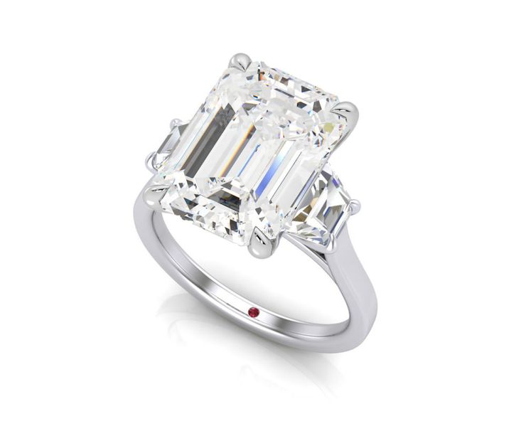 Gwen Stefani engagement ring emerald diamond Trilogy ring