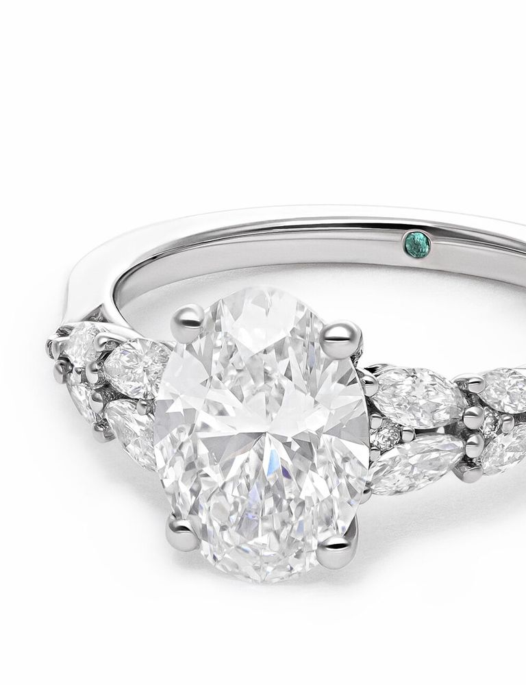 Cascade oval lab grown diamond with cascading marquise and round diamonds platinum engagement ring