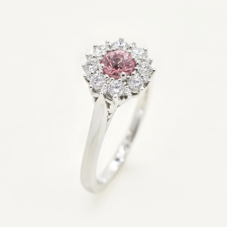 Platinum round pink sapphire round diamond halo engagement ring