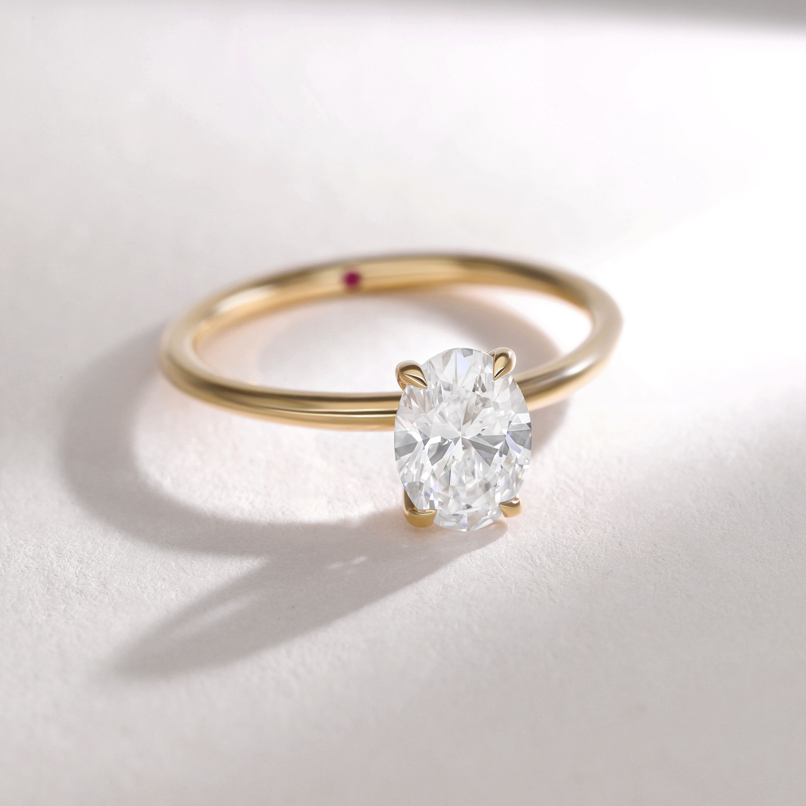 Yellow gold oval diamond demure