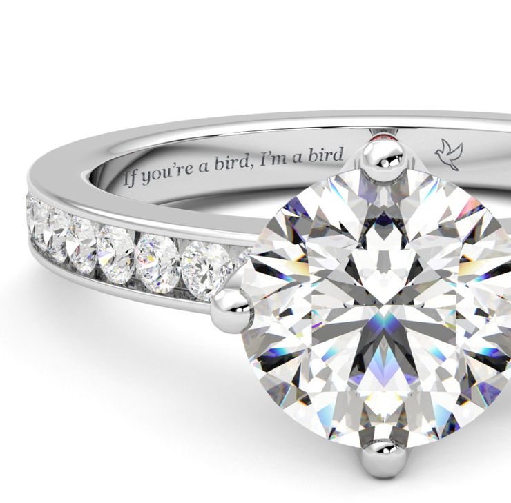 Engagement ring with qutpe engraved from the notebook