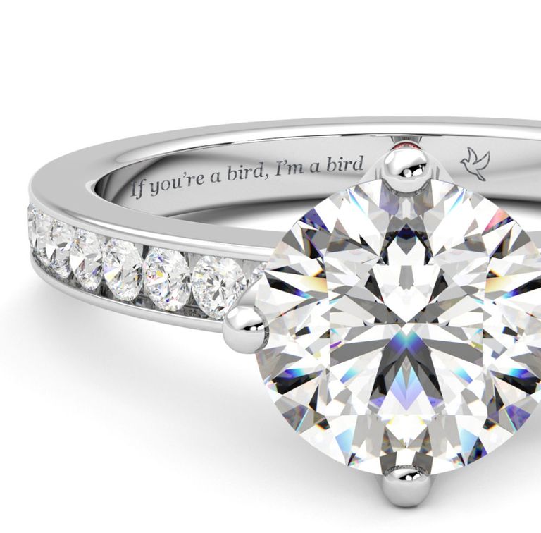 Engagement ring with qutpe engraved from the notebook