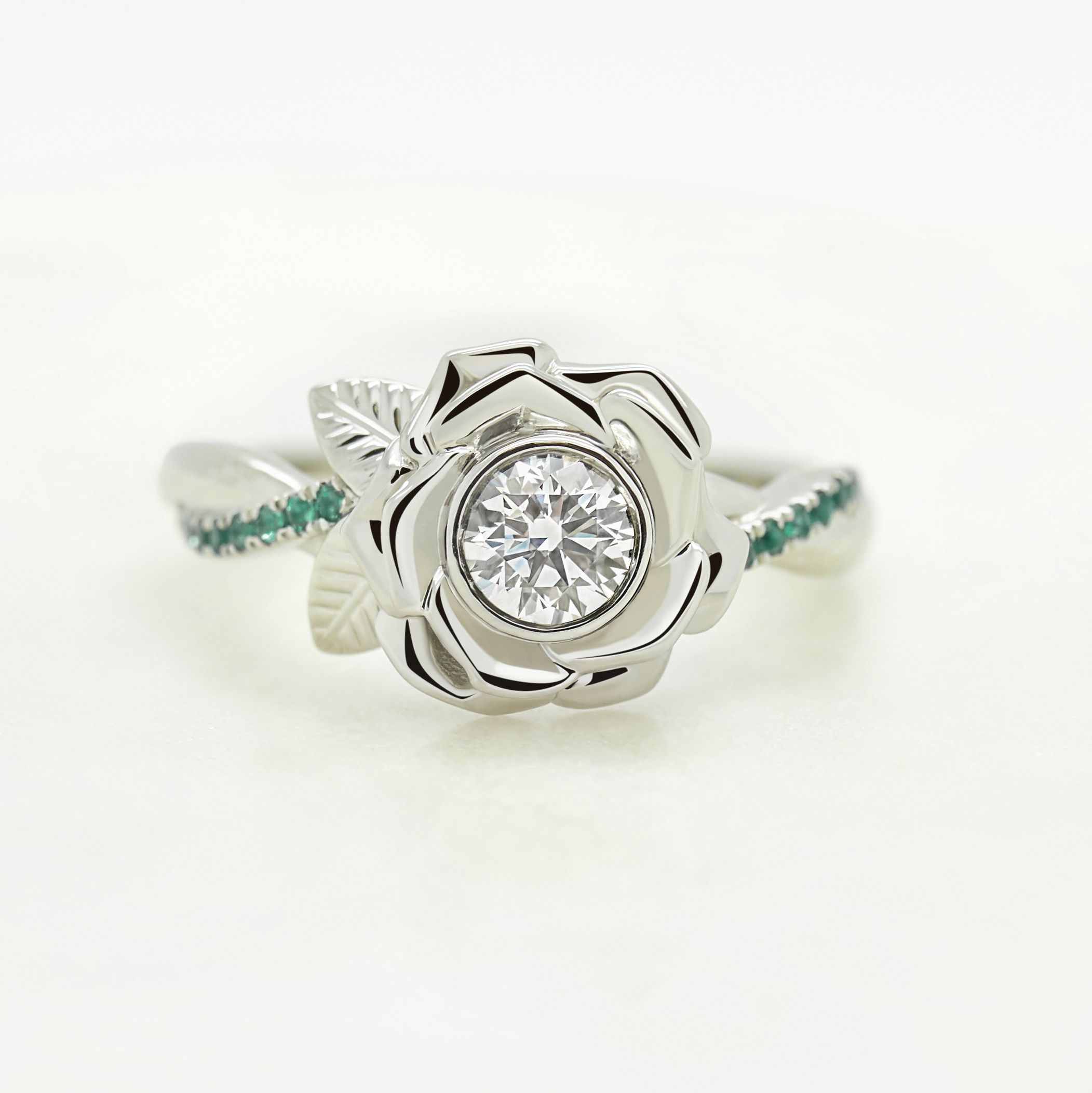 Samantha platinum flower round diamond engagement ring emerald pave
