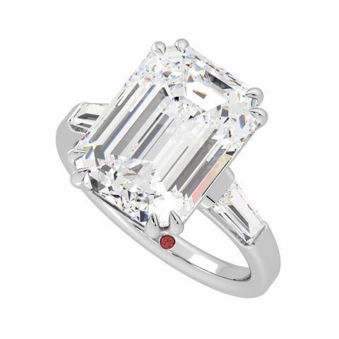 Amal Clooney engagement ring emerald cut diamond tapered baguettes trilogy engagement ring