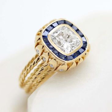 Radiant cut diamond blue sapphire yellow gold engagement ring