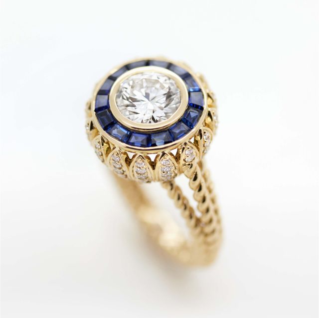 Round diamond blue sapphire halo Mary-Kate Olsen ring front