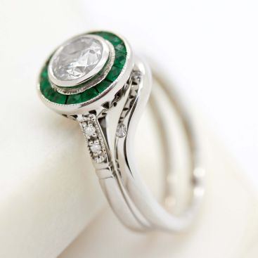 Round diamond emerald halo platinum ring