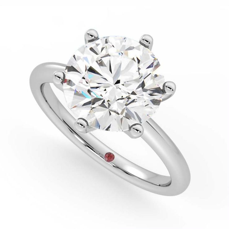 Britney Spearss sparkling round diamond engagement ring side view