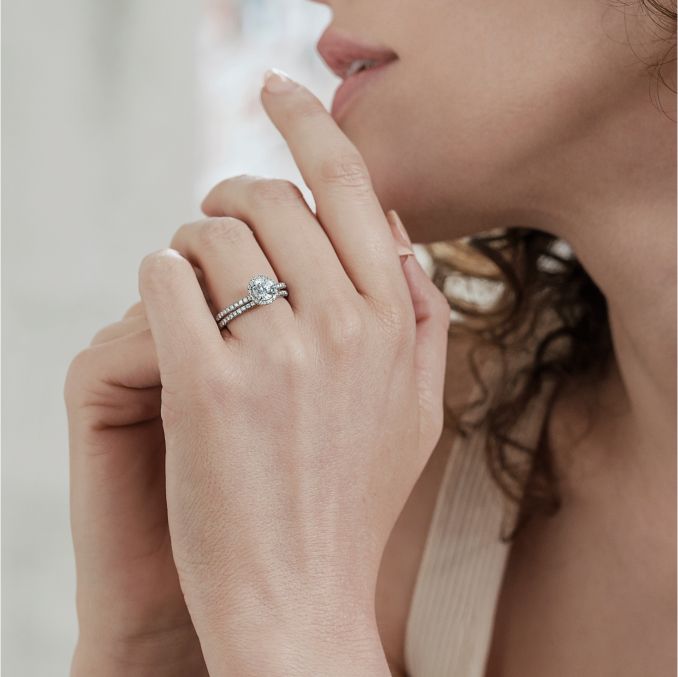 Round diamond allure halo engagement ring