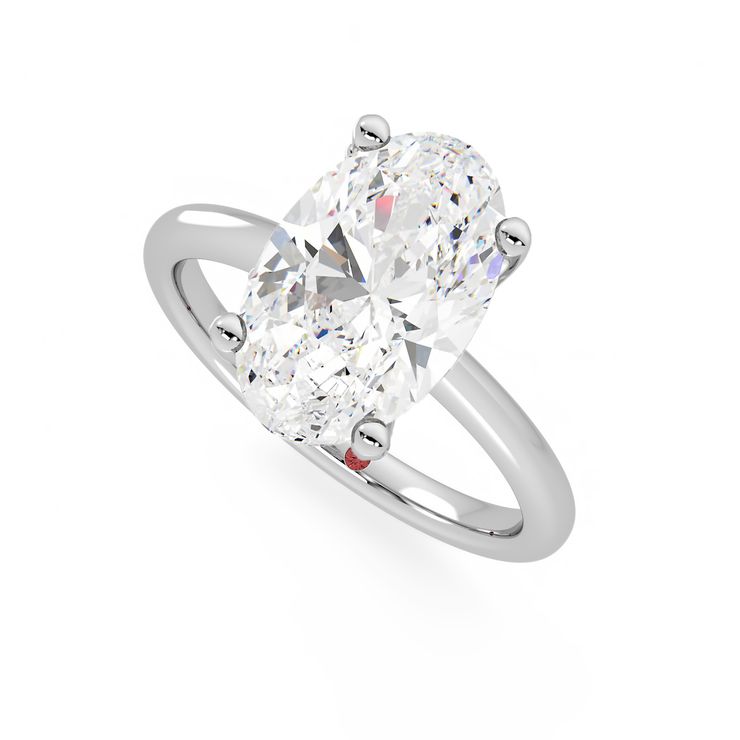 Oval cut diamond solitaire engagement rings