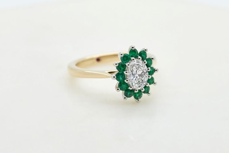 Yellow gold oval diamond emerald halo engagement ring