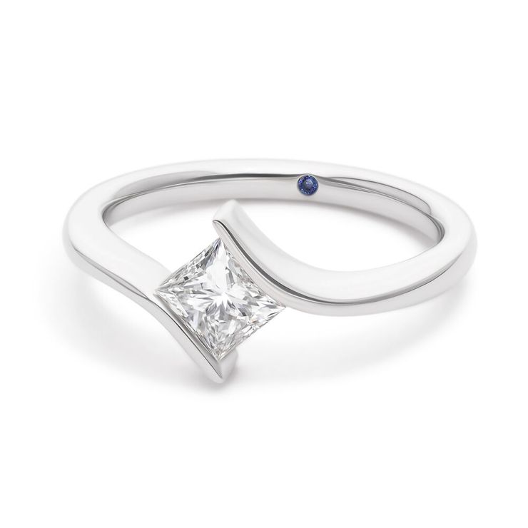 Asymmetric sculptural platinum engagement ring with princess cut diamond