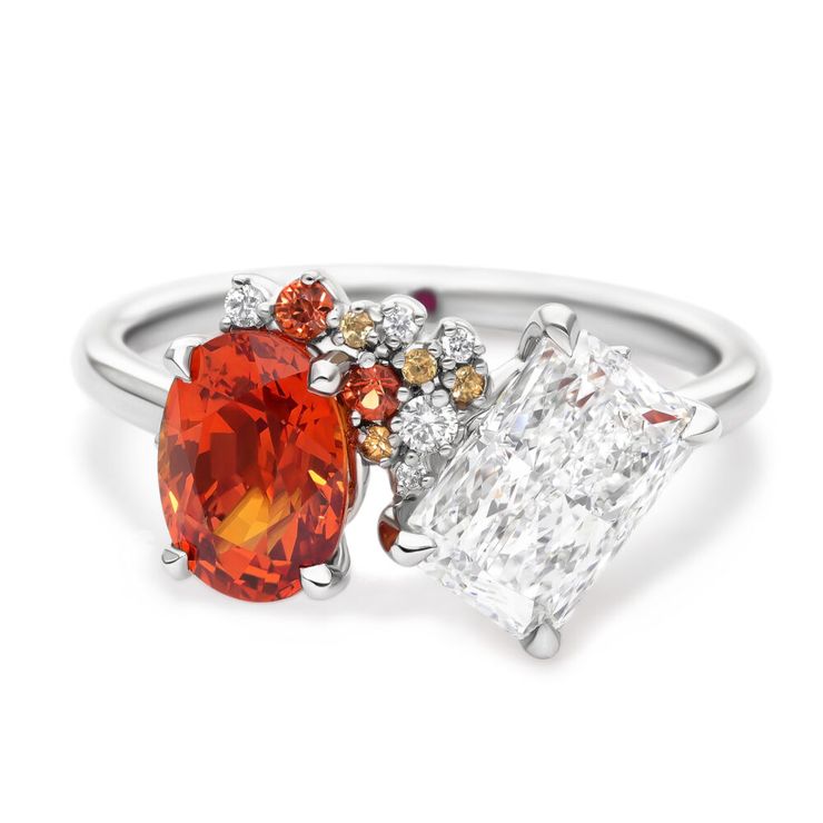 Flame-inspired toi et moi engagement ring with orange oval sapphire and radiant diamond with ombre yellow, orange and white round accent stones