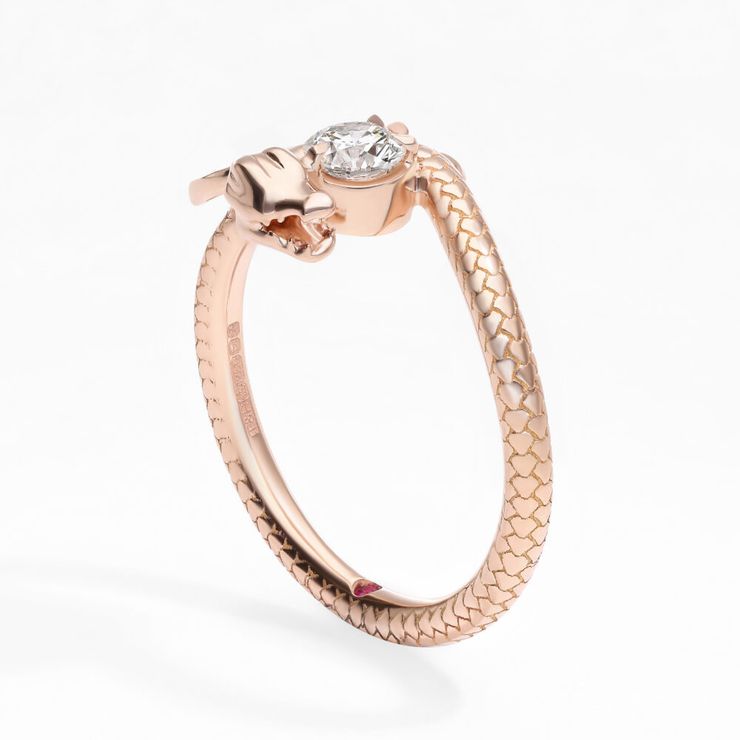 Round diamond dragon inspired engagement ring in rose gold with scale details