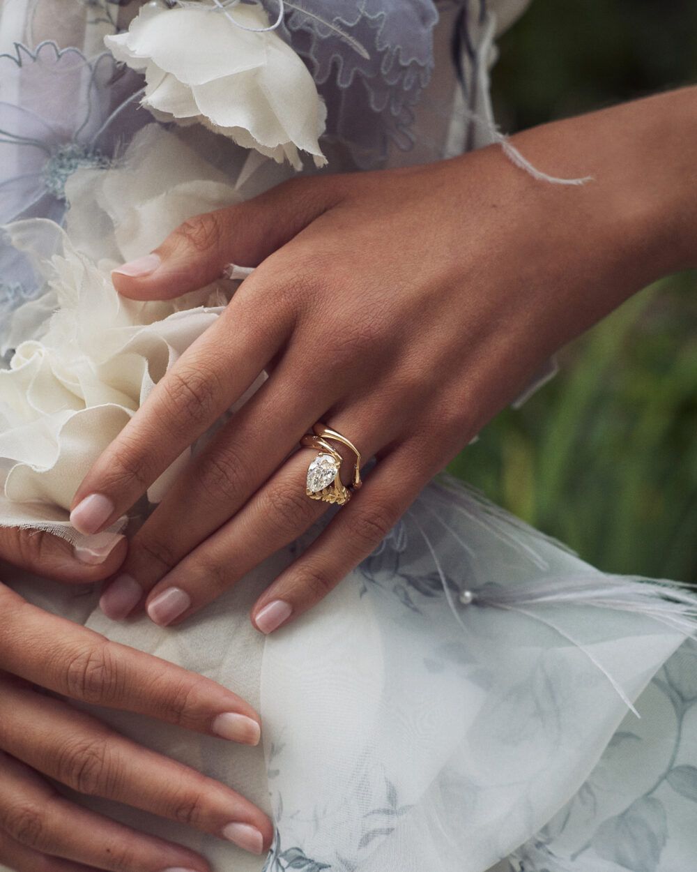 Pear diamond ring with matching wedding band curved