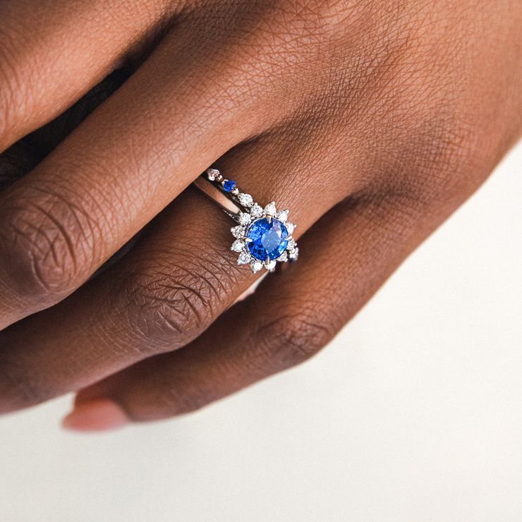 Blue sapphire lyra engagement ring floral