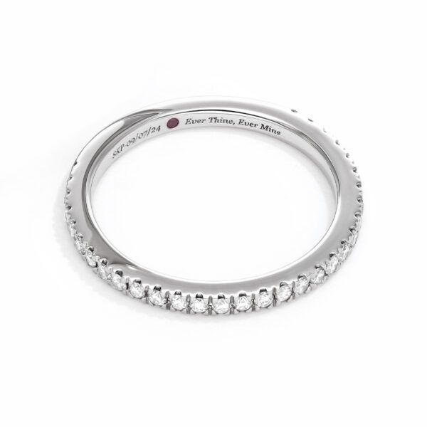  Dainty diamond pavé wedding ring in platinum