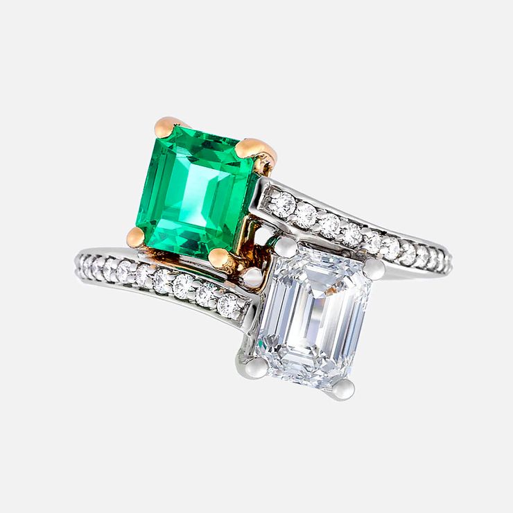 Emerald cut emerald and diamond moi et toi platinum engagement ring