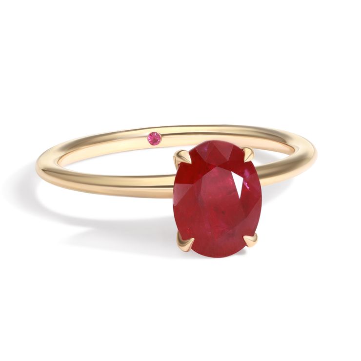 Oval ruby yellow gold solitaire engagement ring