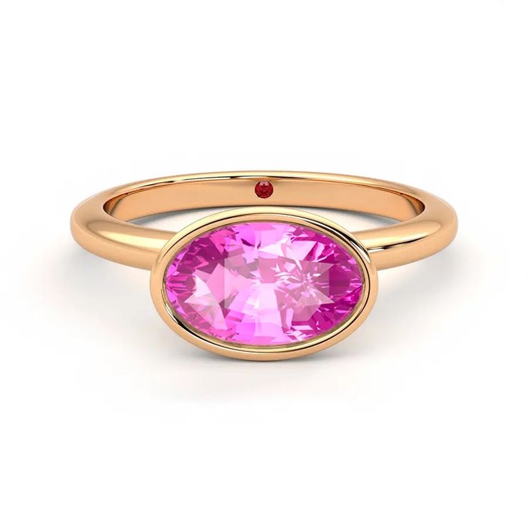 Pink oval sapphire birthstone ring