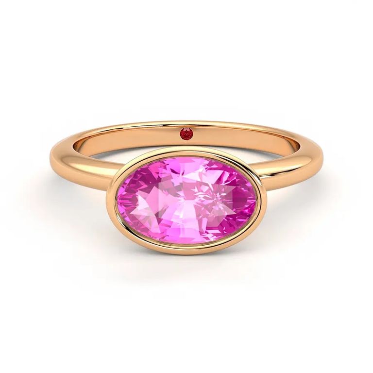 Pink oval sapphire birthstone ring