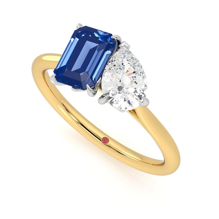 Turelle gold yellow pear 095ct blue ring