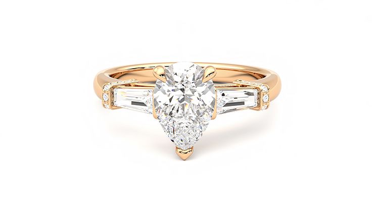 Pear diamond centre and tapered baguettes engagement ring set in 18ct rose gold