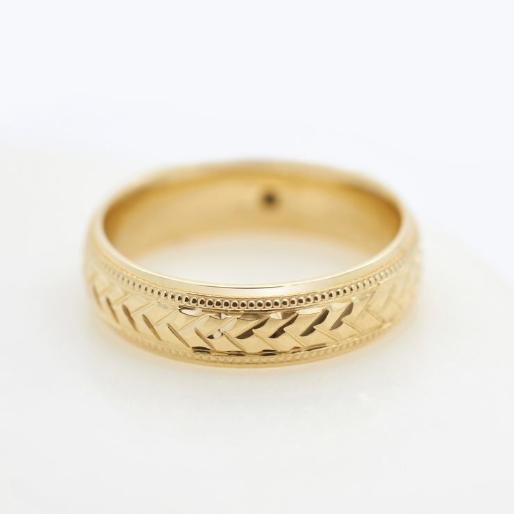 Yellow gold wedding band engraved milgrain