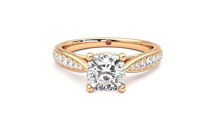 Cushion diamond centre and bead-set diamond band engagement ring set in 18ct rose gold