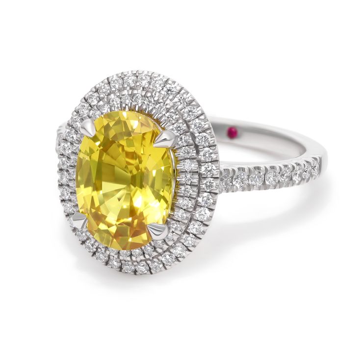 Celestial oval yellow sapphire with double diamond halo engagement ring platinum