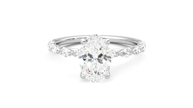 Oval centre engagement ring with petite petal set diamond band