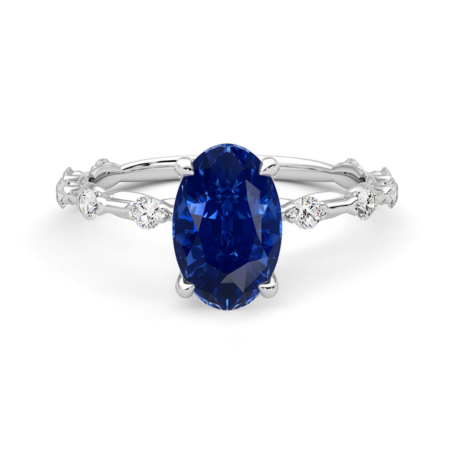 Confetti white oval sapphire blue medium eye clean