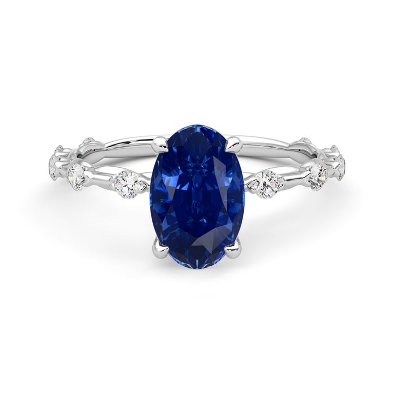 Confetti white oval sapphire blue medium eye clean
