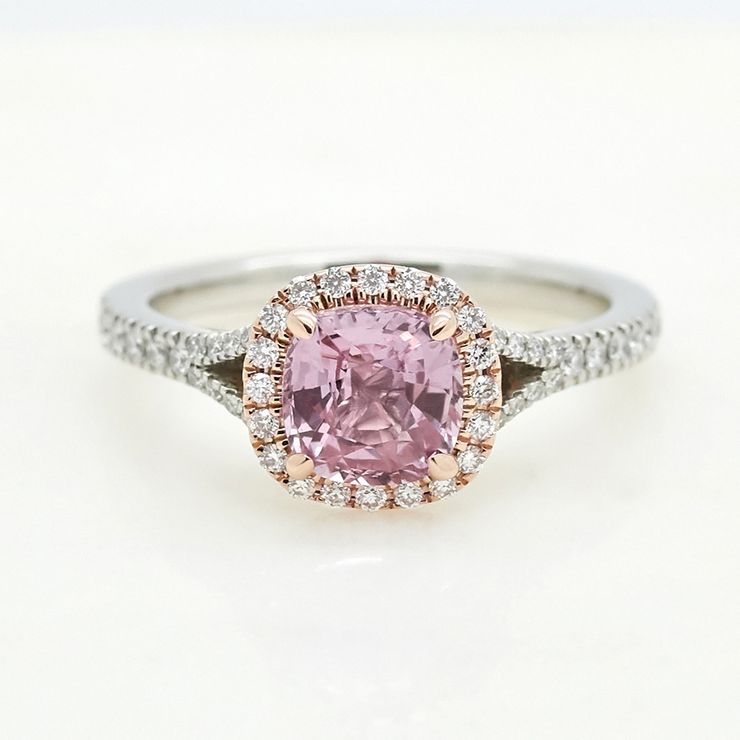 Cushion cut light purple sapphire set in platinum with pavé
