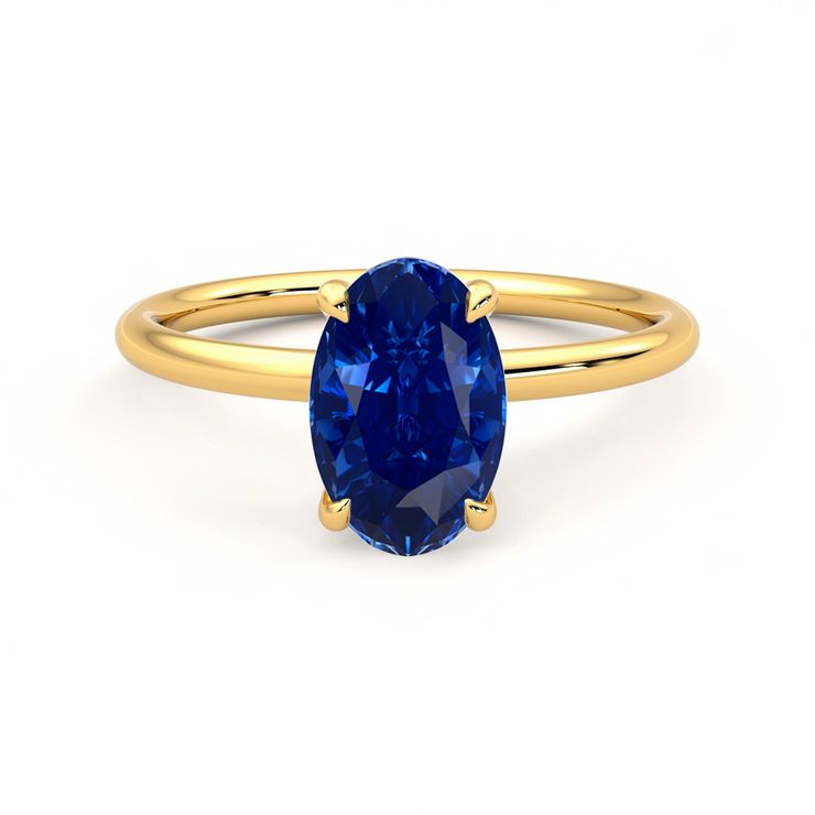 Demure yellow oval sapphire blue medium eye clean