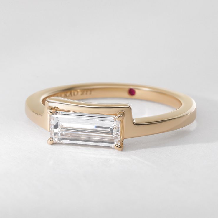 East West elongated diamond baguette yellow gold unisex engagement ring