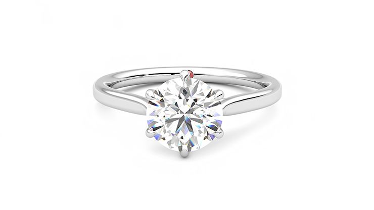 Round solitaire engagement ring with six eagle claws set in 18ct white gold