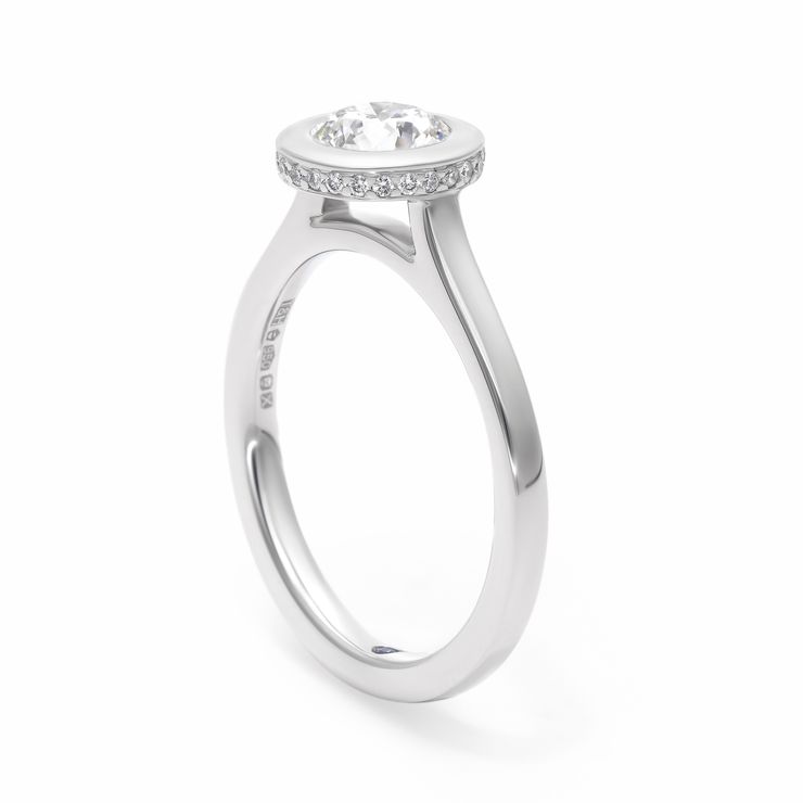 Hidden halo sirius bezel engagement ring