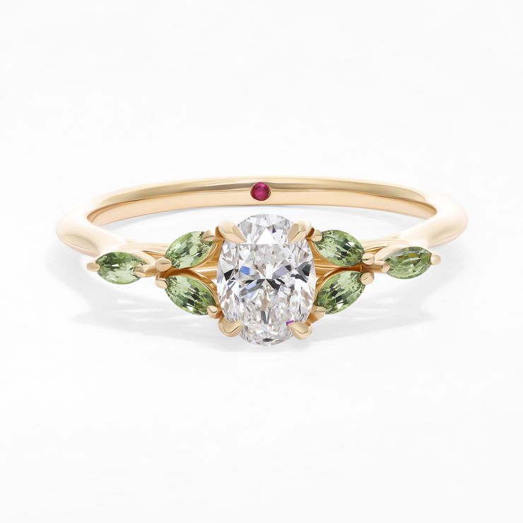 Oval diamond tamora engagement ring in yellow gold with light green marquise sapphires copy