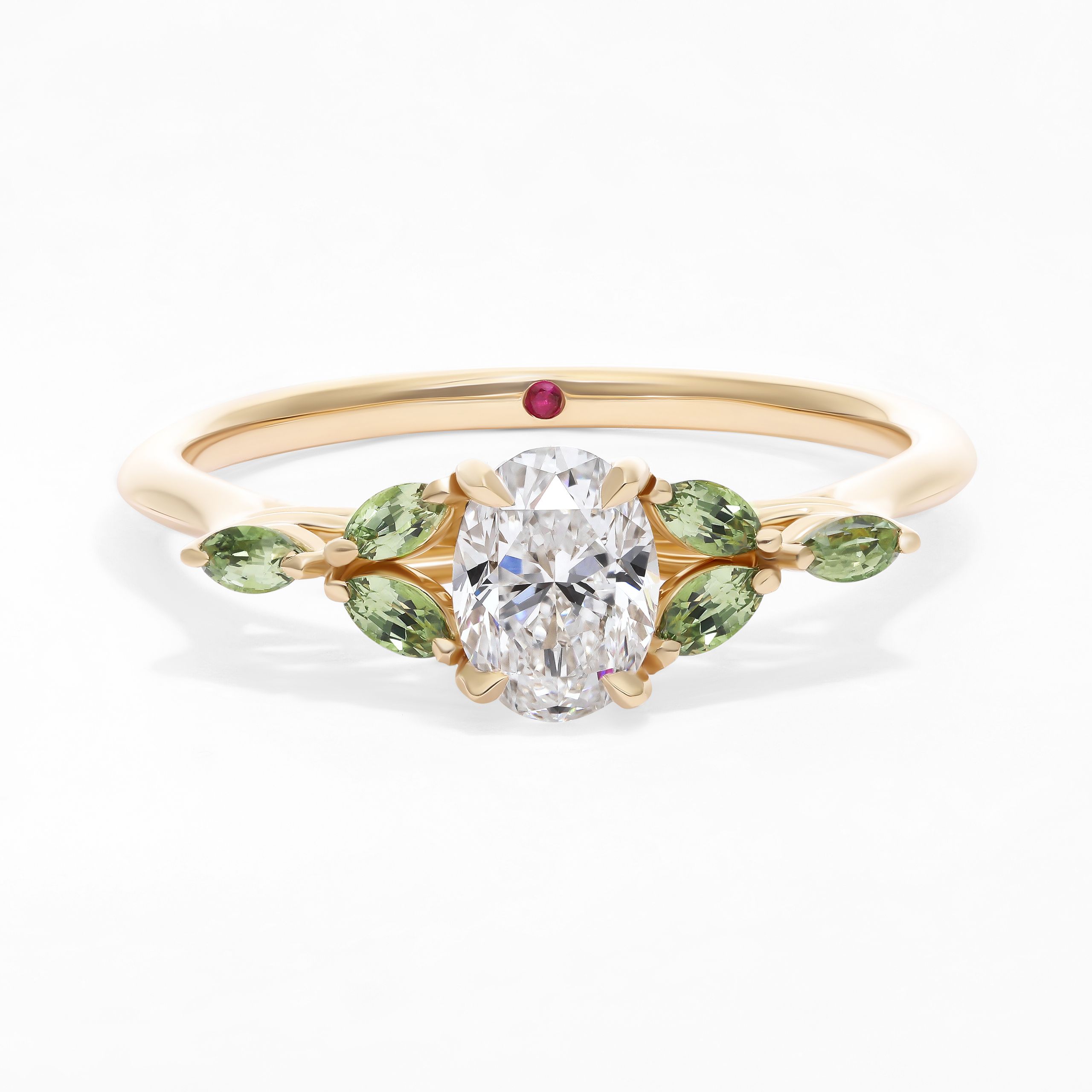 Oval diamond tamora engagement ring in yellow gold with light green marquise sapphires copy
