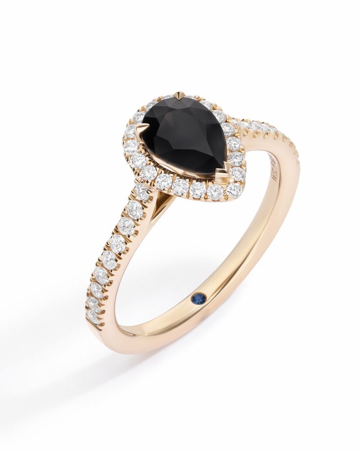 Pear black diamond halo engagement ring yellow gold