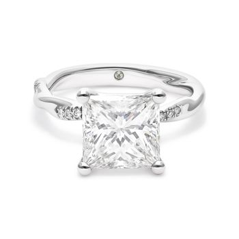 Princess diamond platinum engagement ring with diamond pave and polished intertwined twisted band