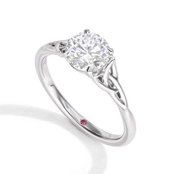 Round diamond solitaire claddagh style twisted band engagement ring in platinum